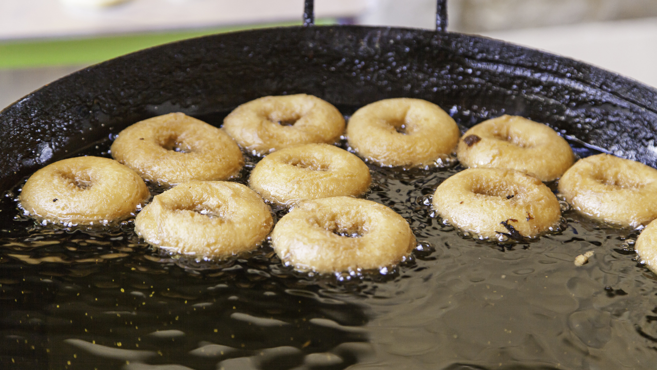 frying process of Eggless and Milkless Donuts