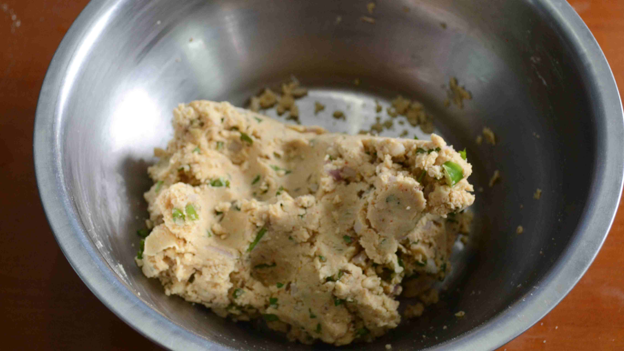 Forming the mixture for Poha Pakoras