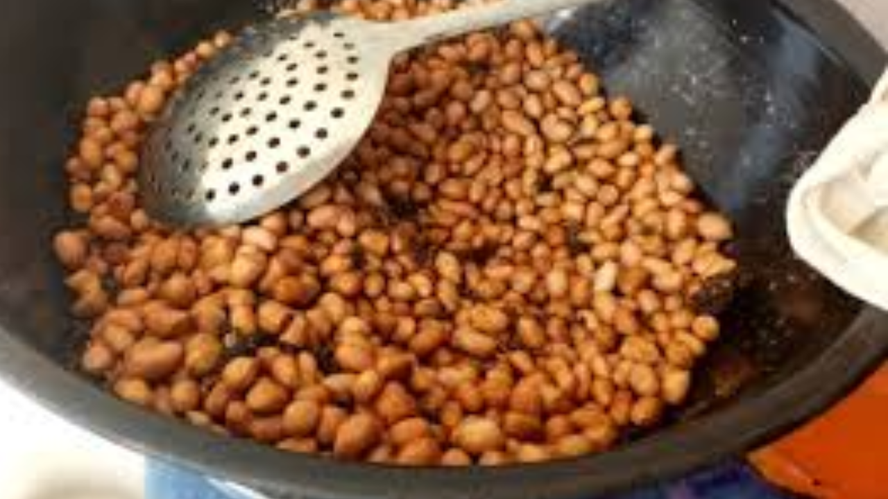 roasting peanuts in a pan