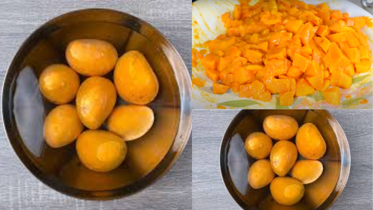 Chopping peeled mangoes into small pieces.